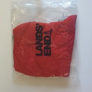 Lands End solid dog puffer vest. Size medium in red.